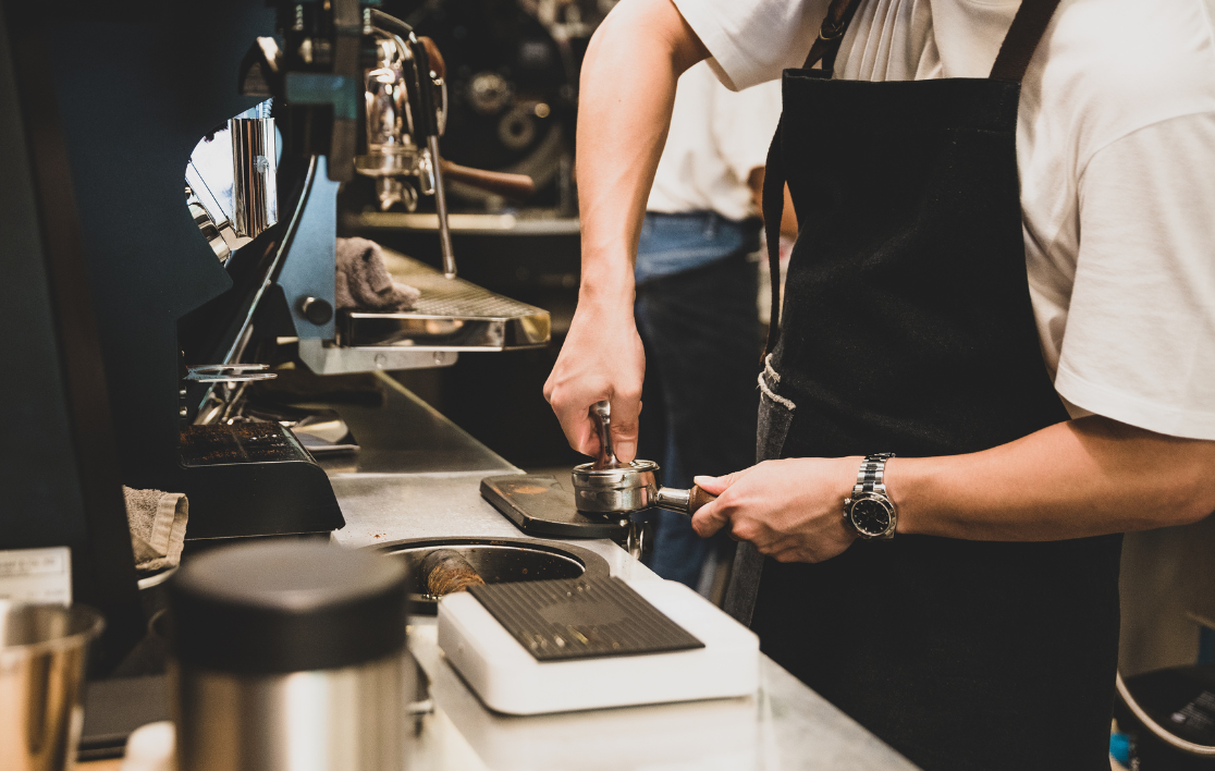 Barista Pouring Milk